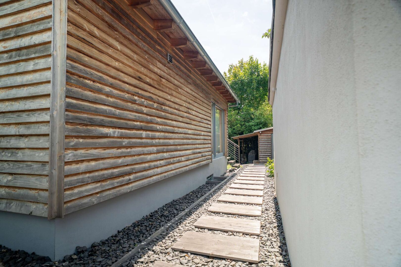 Garage + Gartenhaus